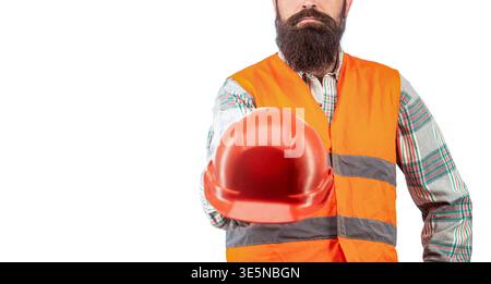 Man builders, industry. Builder in hard hat, foreman or repairman in the helmet. Building, industry - builder concept. Bearded man worker with beard Stock Photo