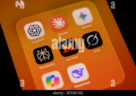 Paris, France. 1st April, 2026. A smartphone screen shows a folder of AI apps including ChatGPT, Claude, Gemini, Perplexity, and Mistral's Le Chat. Stock Photo