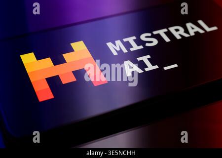 Paris, France. 1st April, 2026. High-angle shot of the Mistral AI branding on a sleek mobile screen, showcasing the company's distinct visual identity Stock Photo