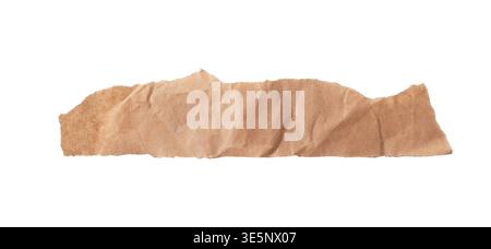 Horizontal strip of torn brown paper with rough edges and visible creases. Natural texture and irregular shape make it suitable for collage, design ac Stock Photo