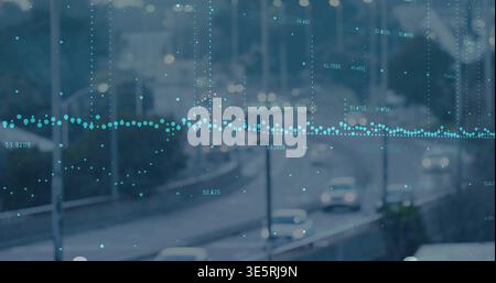 Displaying teal horizontal dotted waveform overlay across urban highway at dusk, showing numbers Stock Photo