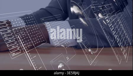 Manipulating professional wearing dark suit and white cuff using holographic panels at wooden desk Stock Photo