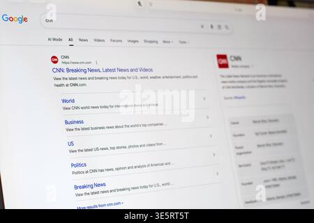March 25, 2026 - Aurora, Ontario, Canada: Computer monitor showing CNN website listed on Google search results page. Online browsing scene highlightin Stock Photo
