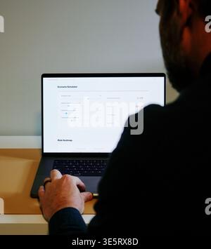 Business Intelligence Analyst Investigates Impact of Artificial Intelligence AI on Long-Term Corporate Revenue and Staffing Concept Stock Photo