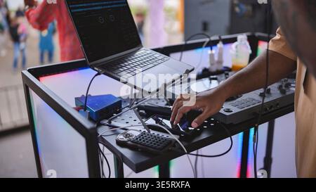 DJ mixing music on deck at India Day festival in Moscow Stock Photo
