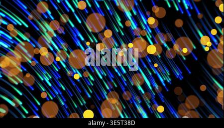 Glowing diagonal neon light streaks streaming in black studio backdrop, showing warm orange bokeh Stock Photo