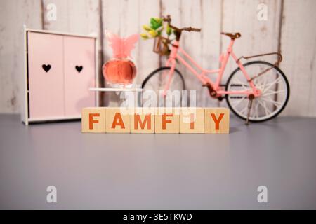 FAMILY Word In Wooden Cube. Stock Photo