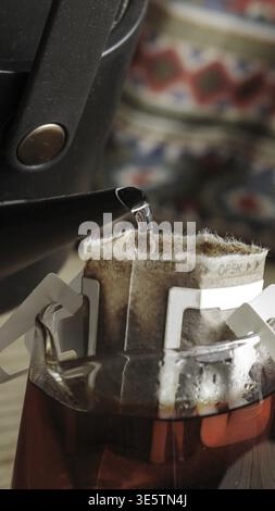 Experience the delight of brewing coffee with this beautiful pourover setup in a cozy, inviting kitchen ambiance Stock Photo