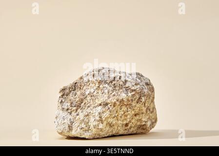 Natural granit stone on beige background, minimal product podium Stock Photo