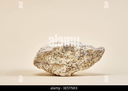 Natural granit stone on beige background, minimal product podium Stock Photo