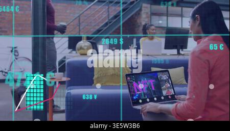 Working woman at right in coral top typing on laptop in lounge, HUD overlays, copy space Stock Photo