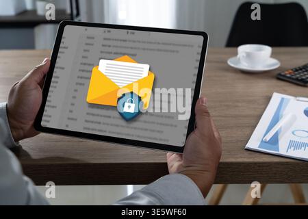 Secure email management concept lock shield over mailbox interface , digital email security, authentication, data privacy, and enterprise IT security Stock Photo
