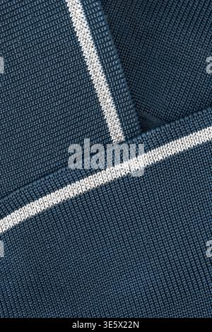 Dark blue knit fabric abstract background closeup Stock Photo