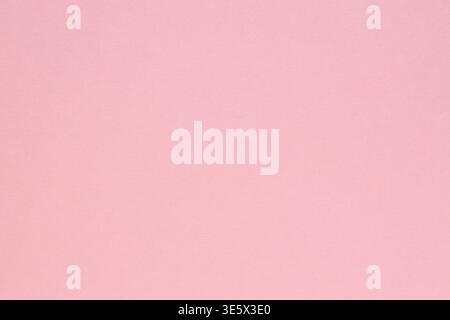 Soft pink paper background with smooth texture for copy space Stock Photo