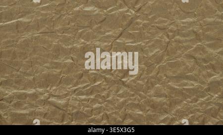 Crumpled brown paper texture background with wrinkled surface for creative design Stock Photo