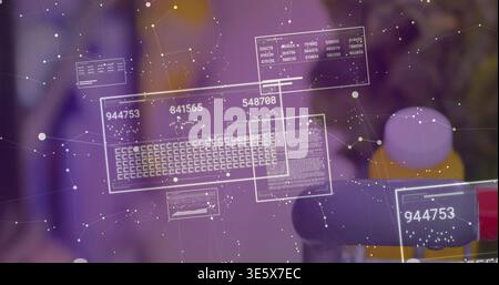 Projecting translucent data panels over tabletop, showing numeric IDs, keyboard grid, node network Stock Photo