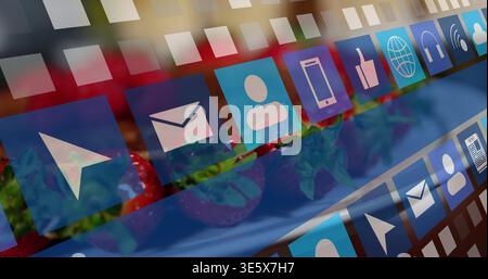 Displaying translucent app grid over blurred strawberries on blue plate, showing paper plane phone Stock Photo