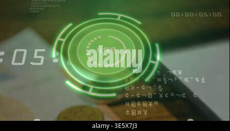Projecting green holographic HUD showing 499 on wooden desk, with coins, smartphone, timecode Stock Photo
