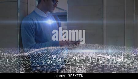 Leaning man in blue sweater tapping smartphone in lobby glasses bag strap AR overlay, copy space Stock Photo