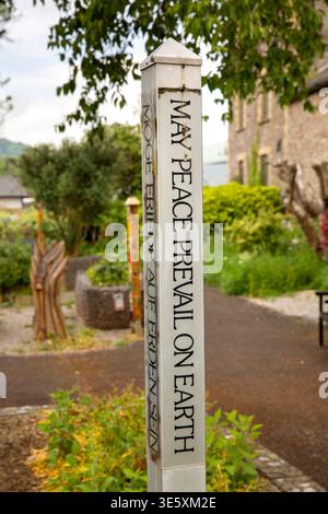 UK, Wales, Powys, Brecon, Bulwark, Peace Garden, ‘may peace prevail on earth’ post Stock Photo
