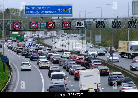 Bristol, UK. 3rd Apr, 2026. As fuel prices climb the Easter Getaway causes traffic congestion on the M5 between junctions 15/16 and 17 at Bristol. Managed motorway speed restrictions are in place due to the volume of traffic heading south towards Devon and Cornwall. Highways England reports speeds below 20 mph. Credit: JMF News/Alamy Live News Stock Photo