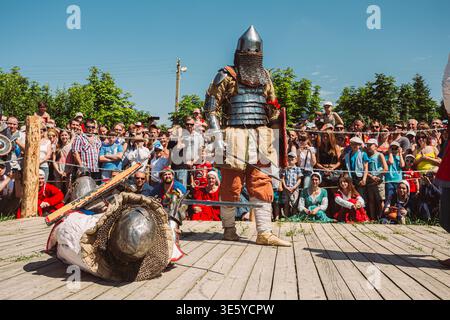 Knights In Fight With Swords. Restoration Of Knightly Battle Stock Photo