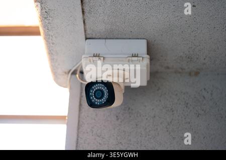 CCTV camera on white background with home security system concept Stock Photo