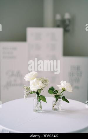 Refined Wedding Decor Featuring Roses And Softfocused Backdrop Stock Photo