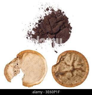 A pile of ground coffee and two used paper coffee filters with stains on an isolated background, top view Stock Photo