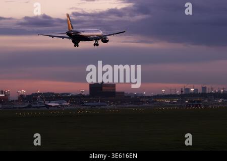 Aeroflot Airbus A320 landing at Sheremetyevo Airport during evening twilight, Moscow Stock Photo