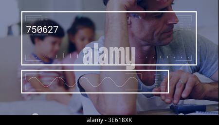Calculating man leaning on left hand in living room wearing gray tee using calculator HUD 750627 Stock Photo