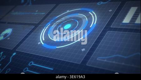 Projecting circular HUD showing rings and glowing core on dark blue grid, with data panels Stock Photo