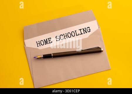 Back to school. Lightbox, headphones, laptop and stationery on a pink background. Online education concept. Stock Photo