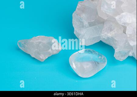 rock crystals are placed on a blue surface Stock Photo