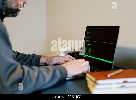 Middle Aged Man Turns Hacker in Hoodie After Using Vibe Coding Command Line Interface Artificial Intelligence Large Language Model Assistant Concept Stock Photo