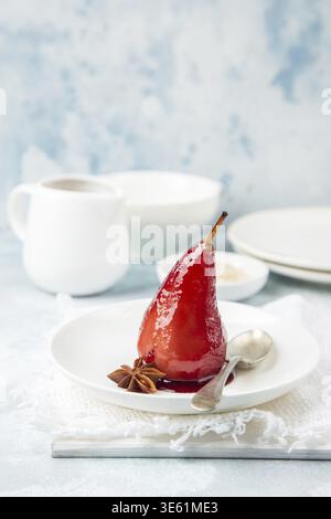 Food, Poached pears in spicy red wine syrup, selective focus Stock Photo