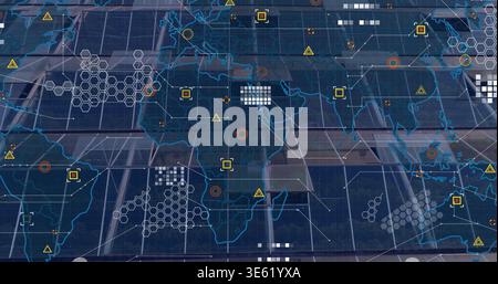 Displaying global map overlay on console, showing hex grid, warning triangles, glass reflection Stock Photo