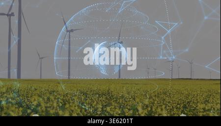 Projecting blue holographic globe hovering above yellow canola field at wind farm, network mesh Stock Photo