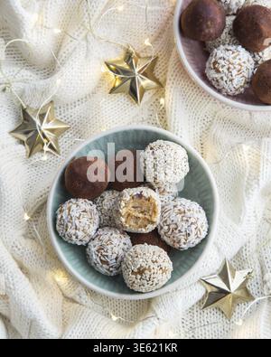 Food, Healthy raw dates and coconut candies balls, top view Stock Photo
