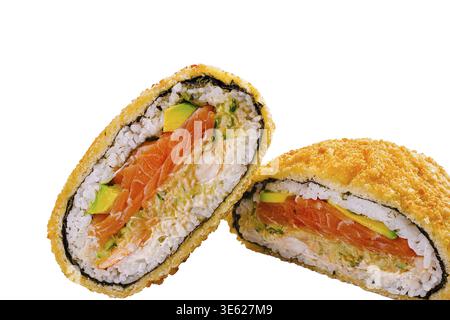 Food, Crispy sushi rolls cut in half reveal fresh salmon, creamy avocado, and seasoned rice. The tempura coating adds a golden crunch to this delightf Stock Photo