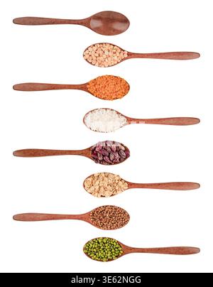 Set of different cereals in wooden spoons isolated on white background. Stock Photo
