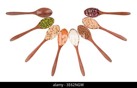 Set of different cereals in wooden spoons isolated on white background. Stock Photo