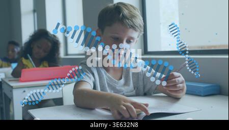 Pointing student in gray tee holding pencil and pointing to worksheet at classroom desk, DNA helix Stock Photo