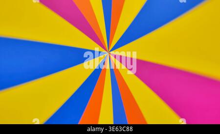 Vibrant abstract background with a colorful radial sunburst pattern Stock Photo