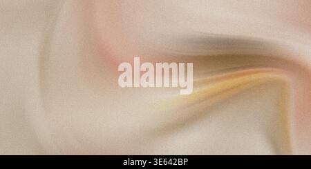 The image features a close-up view of a fabric with a soft peach and cream color palette. The fabric appears to have gentle folds, giving it a smooth Stock Photo
