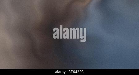 An abstract texture featuring a blend of dark brown and blue colors with smooth transitions creating a sense of depth and visual appeal Stock Photo