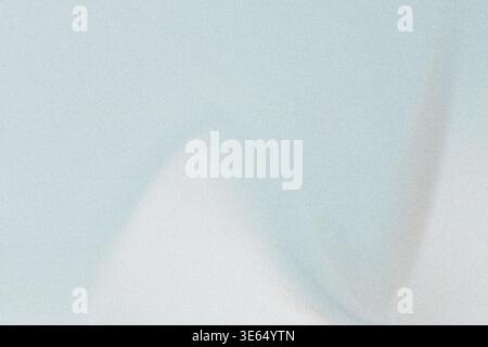 A textured background featuring a soft blue and white gradient with a subtle shadow effect and a rough, speckled surface Stock Photo
