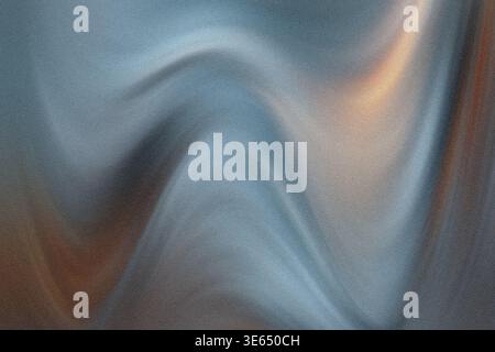 This image features a close-up of a blue and orange fabric with smooth folds and curves, showcasing a mix of cool and warm tones in a textured, organi Stock Photo