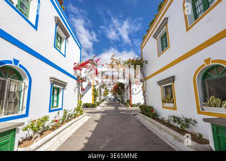 Puerto de Mogan typical colorful houses with flowers on Gran Canaria island holiday traveling in Spain Stock Photo