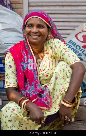 Smiling woman in a sari at Sardar Market in the Old City area of Jodhpur, India Stock Photo